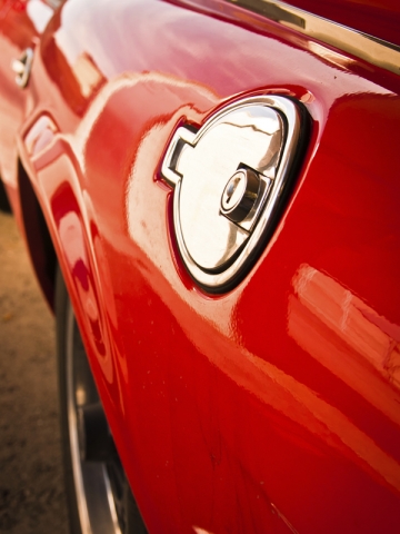 petrol cap on a vintage old red car
