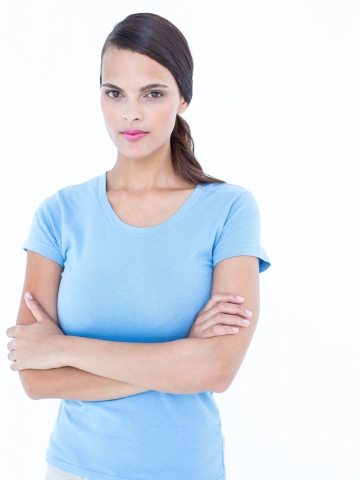 Unsmiling woman looking at camera